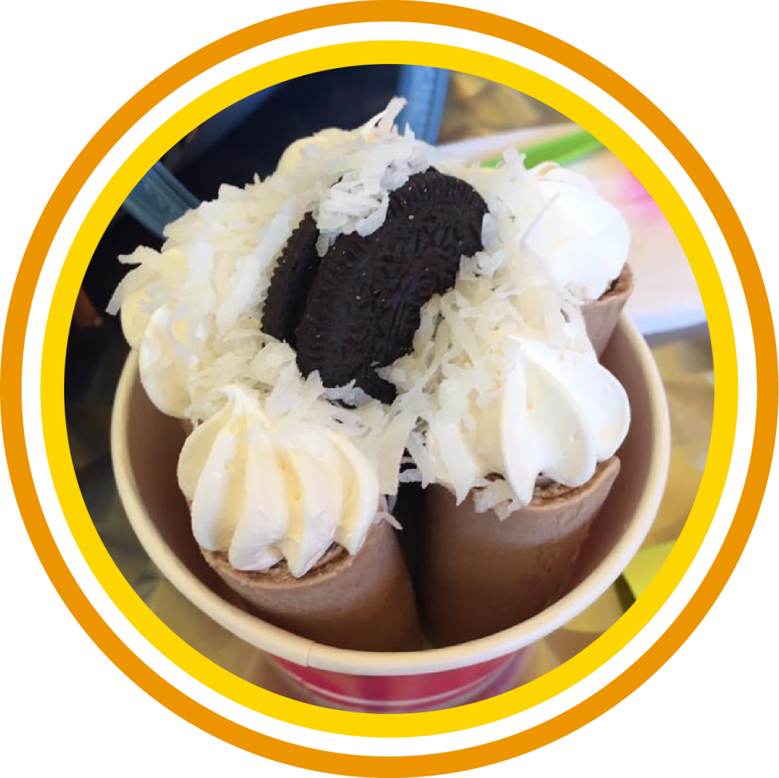 The Ice King Classic — rolled ice cream topped with whipped cream and Oreo
